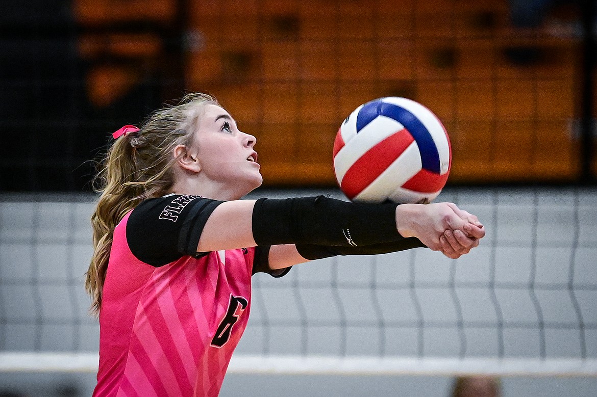 Flathead's Addison Thornsberry (6) bumps the ball over the net against Glacier at Flathead High School on Thursday, Oct. 3. (Casey Kreider/Daily Inter Lake)