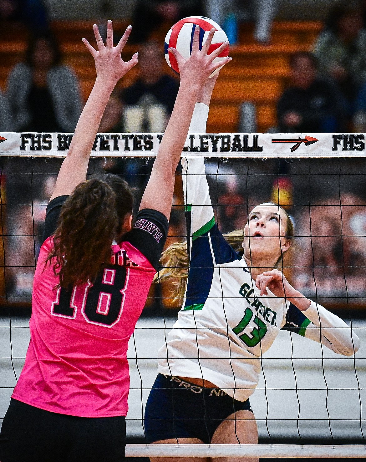 Glacier's Grace Lingle (13) goes up to the net for a kill against Flathead at Flathead High School on Thursday, Oct. 3. (Casey Kreider/Daily Inter Lake)