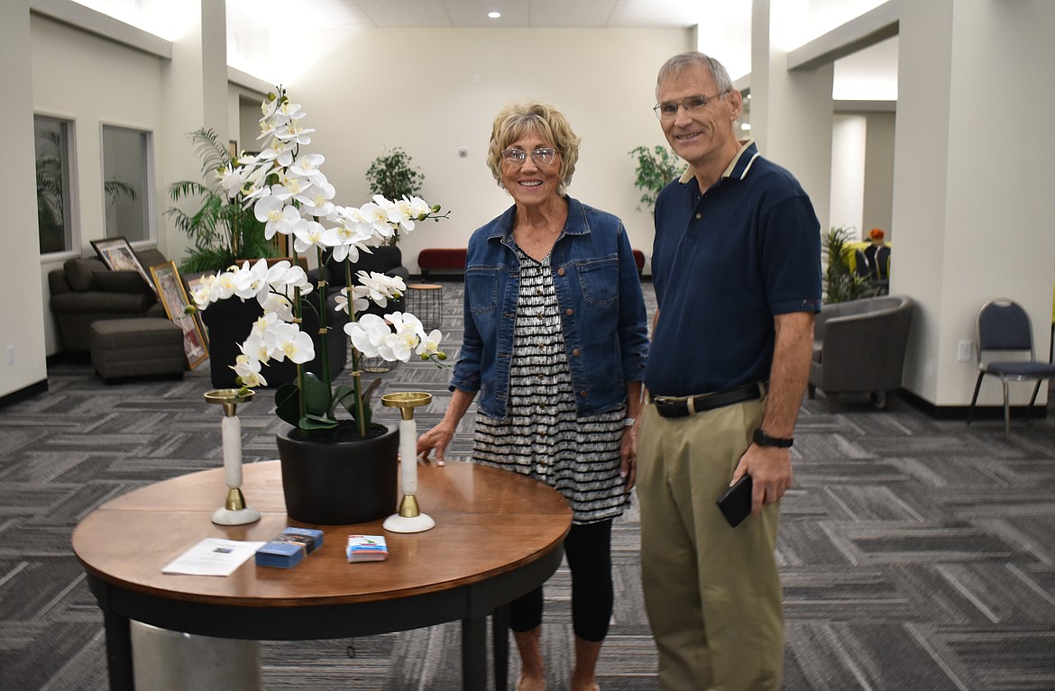 Lifelong Moses Lake Seventh-day Adventist Church member Judy Twigg, left, and Pastor Clinton Meharry stand in the entryway of the new church building, which will be opened on Saturday.