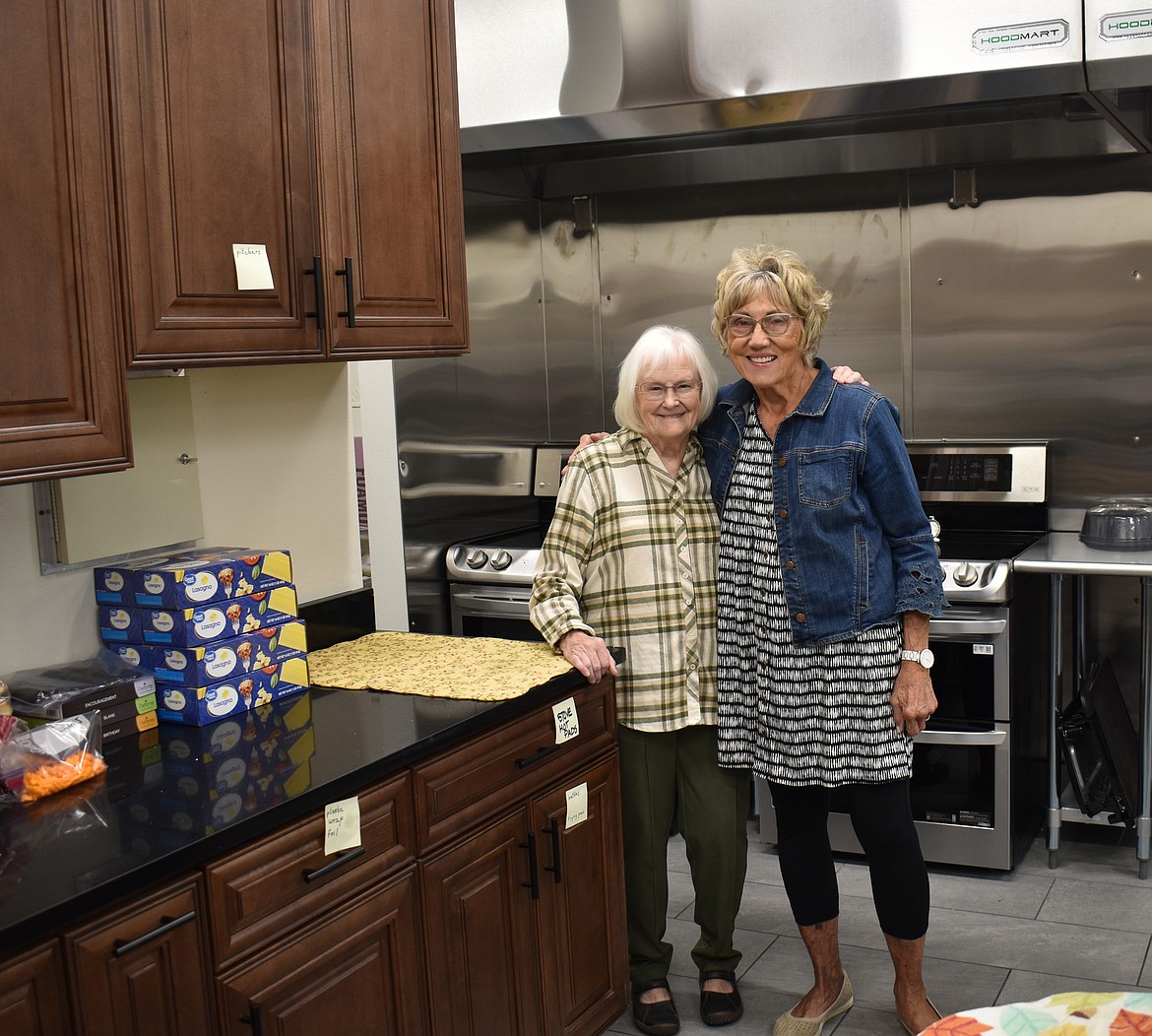 Moses Lake Seventh-day Adventist members Azure Goltz, left, and Judy Twigg stand in the kitchen of the new church building. The kitchen will see some use on Saturday as the church welcomes the public for meals, worship and fellowship.