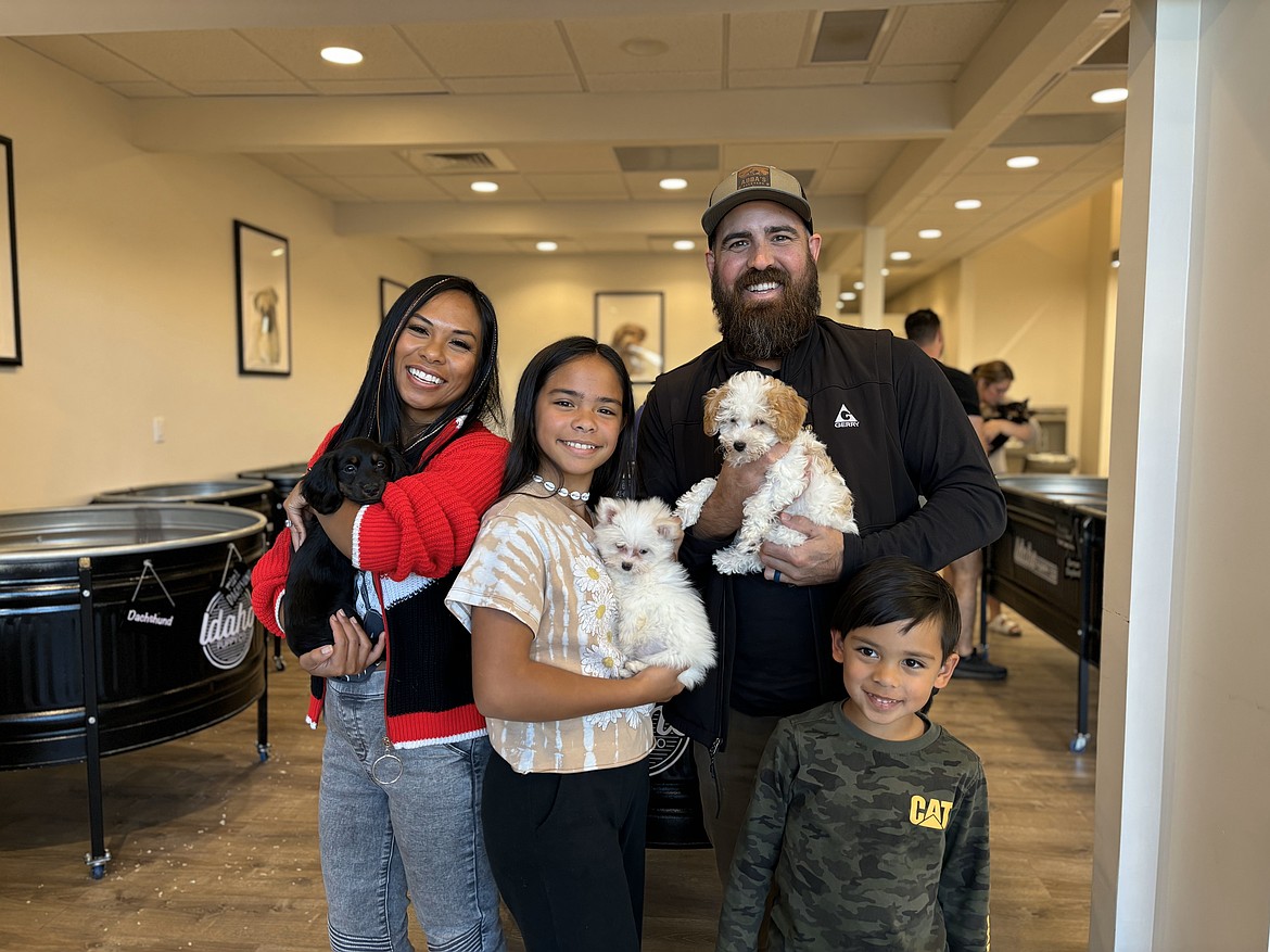 Idaho Puppy Co. family of customers (from left) Michelle, Adam, Hannah and Daniel Carey.