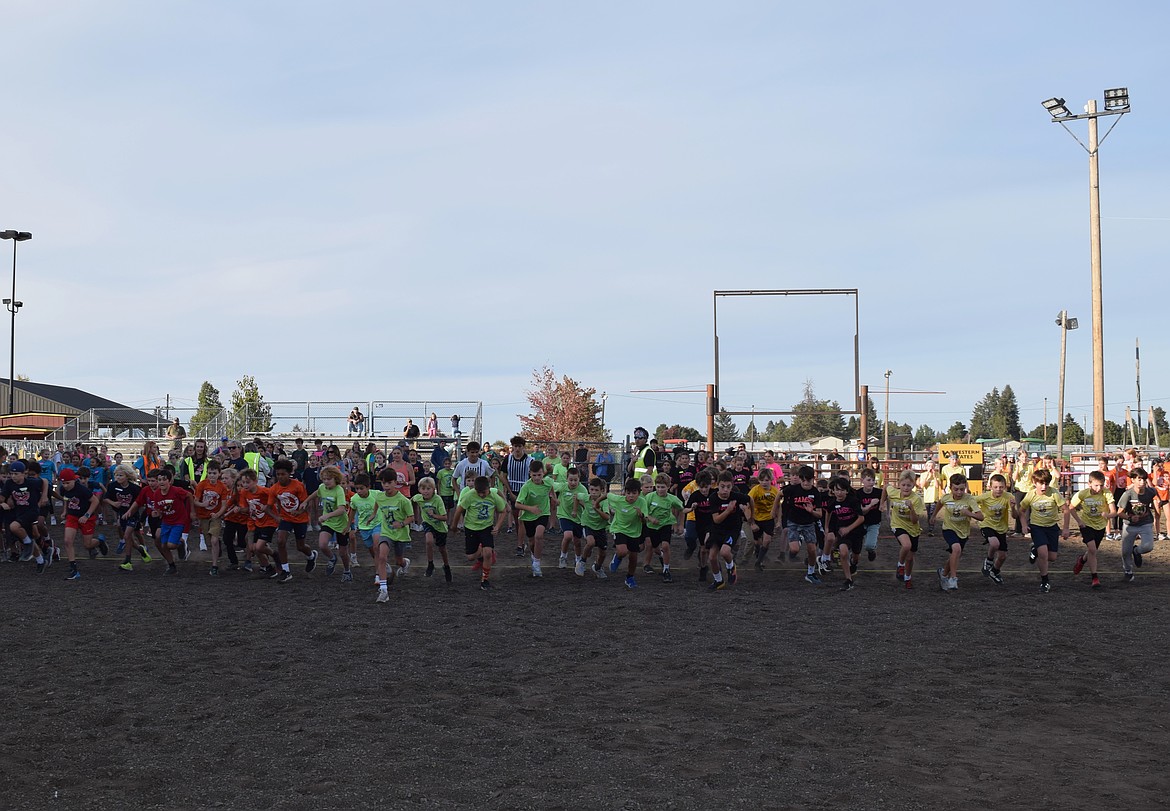 And they're off! Fifth grade boys run their race in the CDA School District Cross Country Meet.