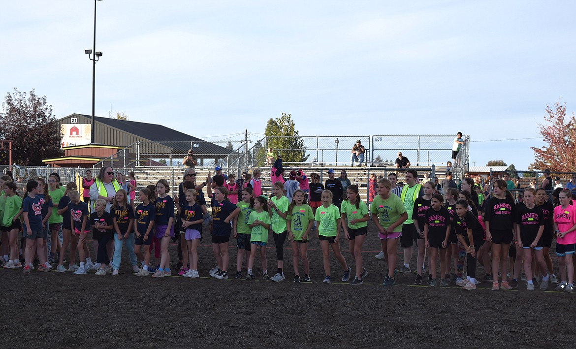 Fourth grade girls line up ahead of their race during the CDA District Cross Country Meet.