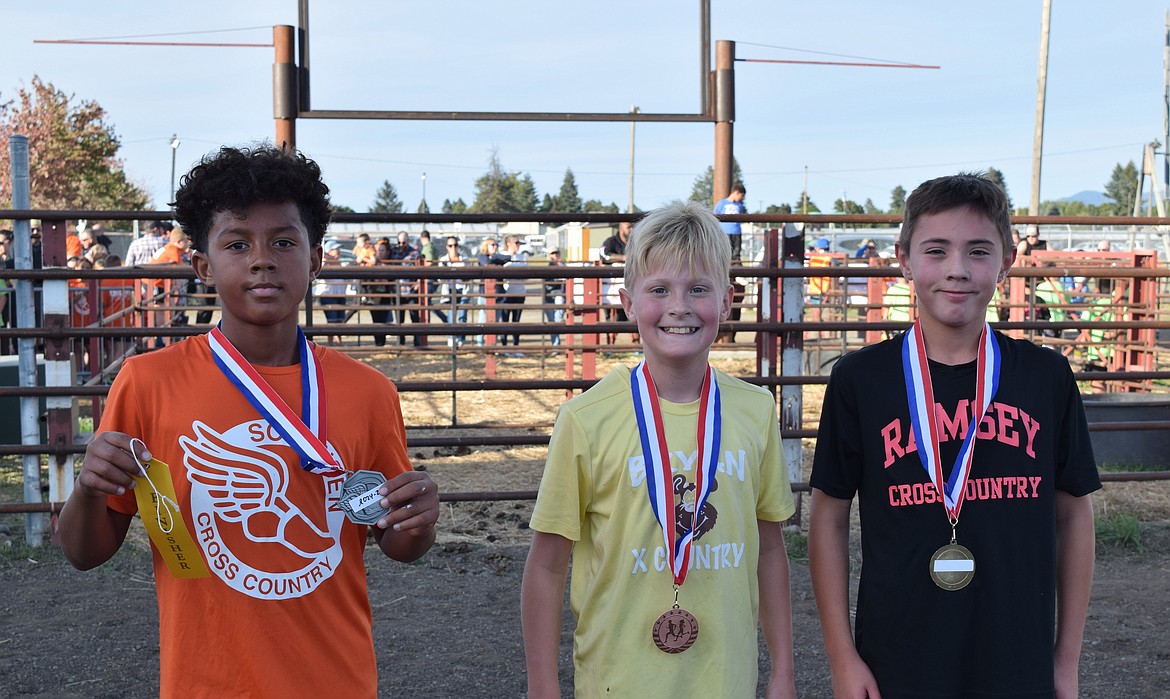 Winners of the fifth grade boys' race, from left: Aurelius Brennan (Sorensen Magnet School), Evan Wallace (Bryan Elementary) and Quinten Wilburn (Ramsey Elementary).