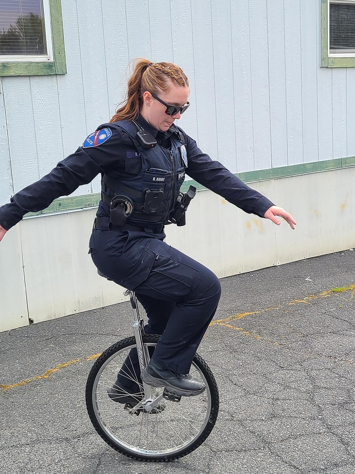 Ephrata Police Department Officer Rebecca Amos rides a unicycle on Sept. 12. EPD posted her on National Police Women’s day. Amos is the only female officer at EPD.