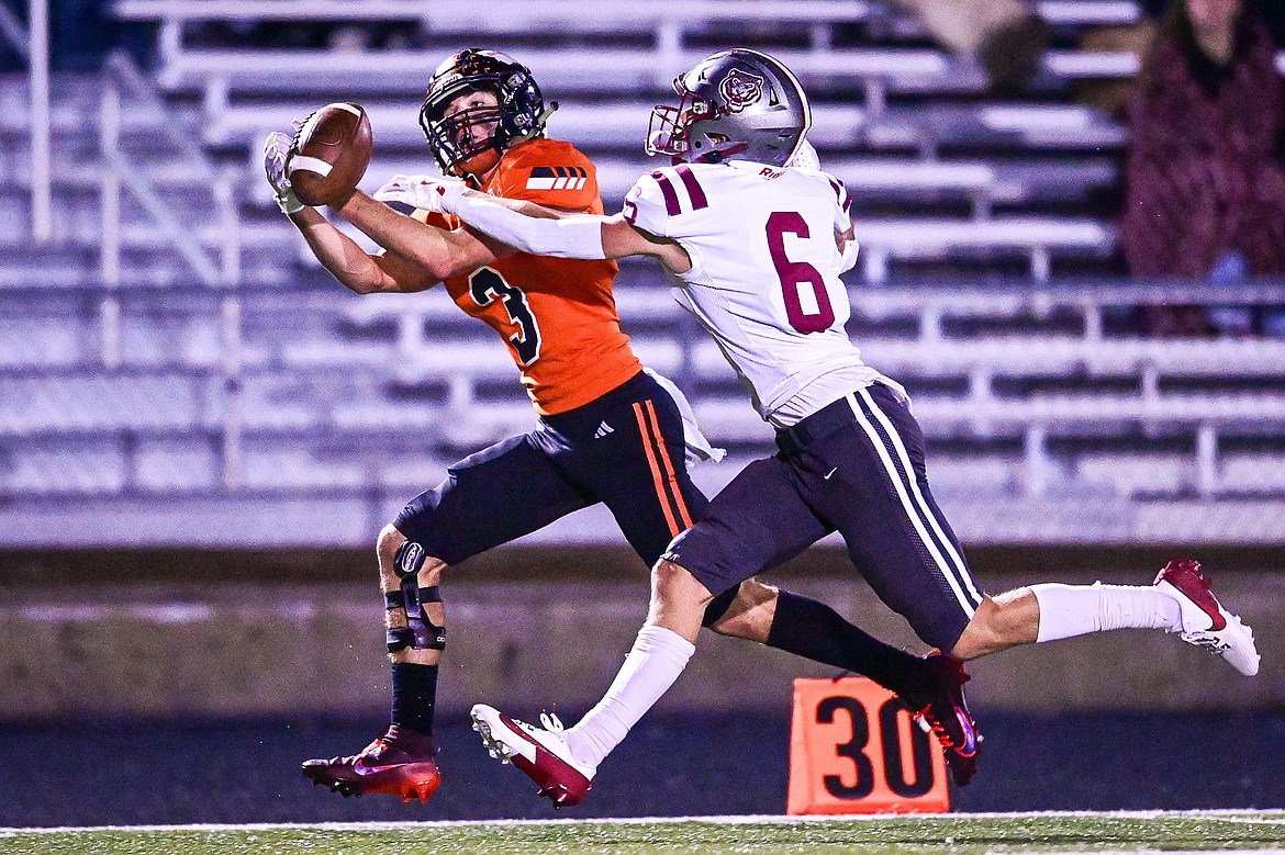 Helena defensive back Brady Swenson (6) deflects a pass to Flathead wide receiver Lane Chivers (3) in the first quarter at Legends Stadium on Friday, Oct. 4. (Casey Kreider/Daily Inter Lake)