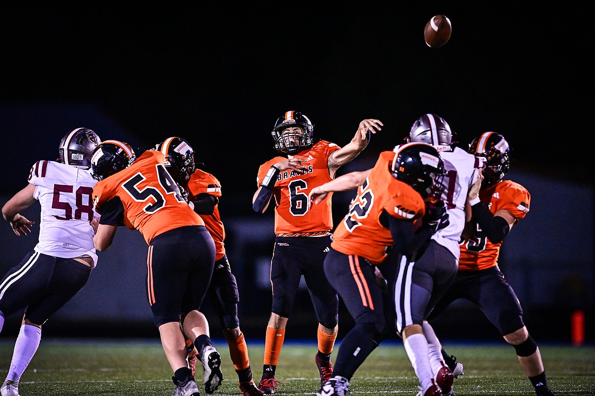 Flathead quarterback Eli Coopman (6) throws a pass downfield in the second quarter against Helena at Legends Stadium on Friday, Oct. 4. (Casey Kreider/Daily Inter Lake)