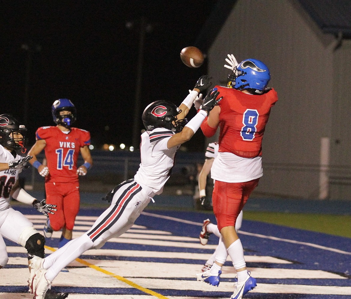 MARK NELKE/Press
Tucker Booth (8) of Coeur d'Alene makes a leaping catch in the end zone for a touchdown in the second half vs. Camas at Viking Field.