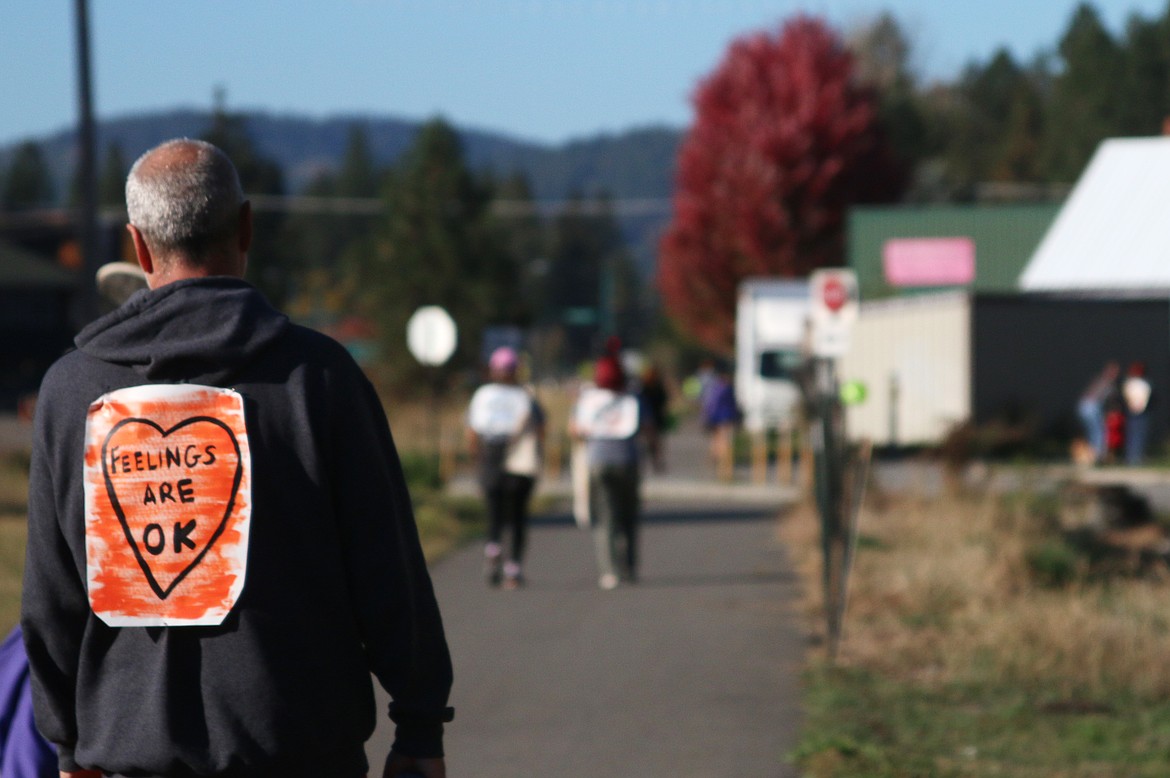 A participant takes part in NAMI Far North's NAMI Walk in October 2023.