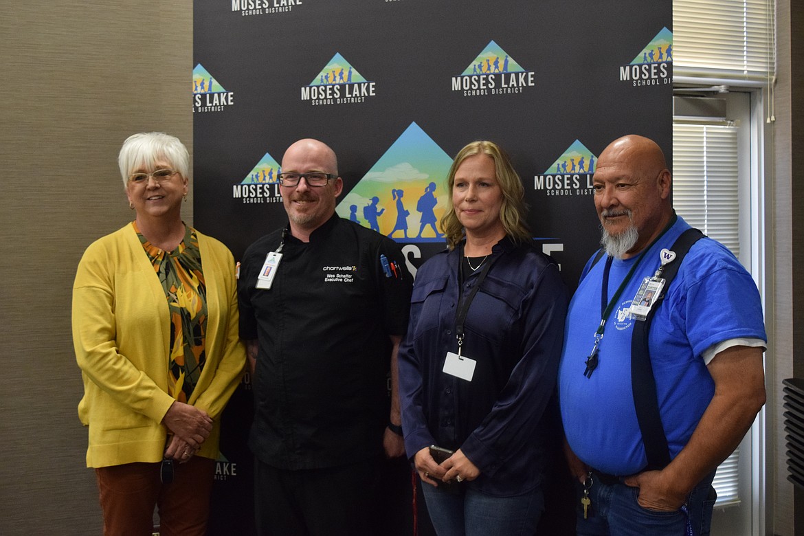 From left to right: Food Service Manager Mel Lopez, Executive Chef Wes Schaffer, Director of Maintenance Rachel Shae and Sagepoint Elementary Day Custodian Ray Chavez are recognized during the Moses Lake School District meeting. 
“Our schools and school districts could not operate without the functions of all of these folks,” Interim Superintendent Carol Lewis said.