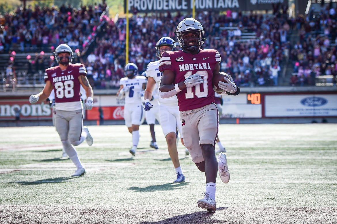 Grizzlies running back Eli Gillman (10) scores a touchdown on a 37-yard run in the first quarter against Weber State at Washington-Grizzly Stadium on Saturday, Oct. 5. (Casey Kreider/Daily Inter Lake)