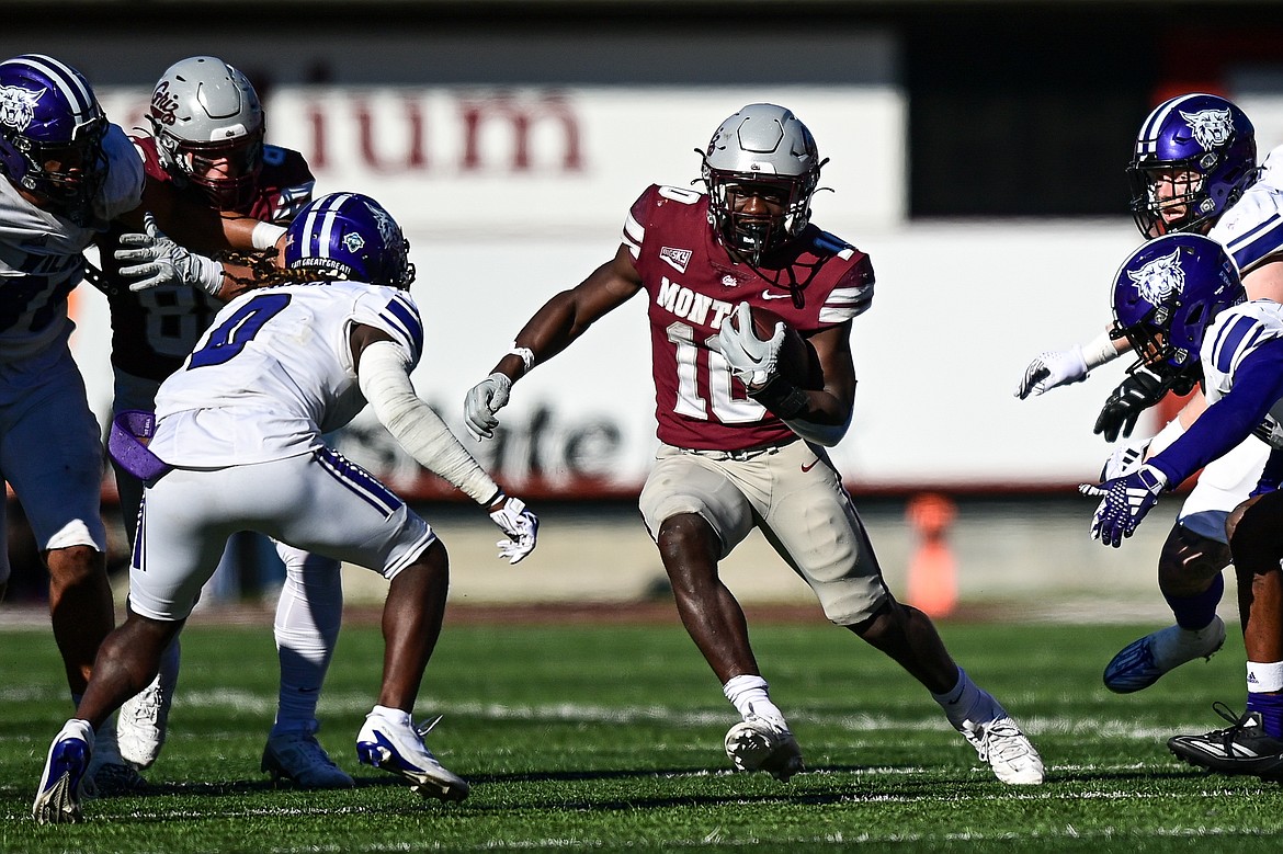 Grizzlies running back Eli Gillman (10) looks for running room in the fourth quarter against Weber State at Washington-Grizzly Stadium on Saturday, Oct. 5. (Casey Kreider/Daily Inter Lake)