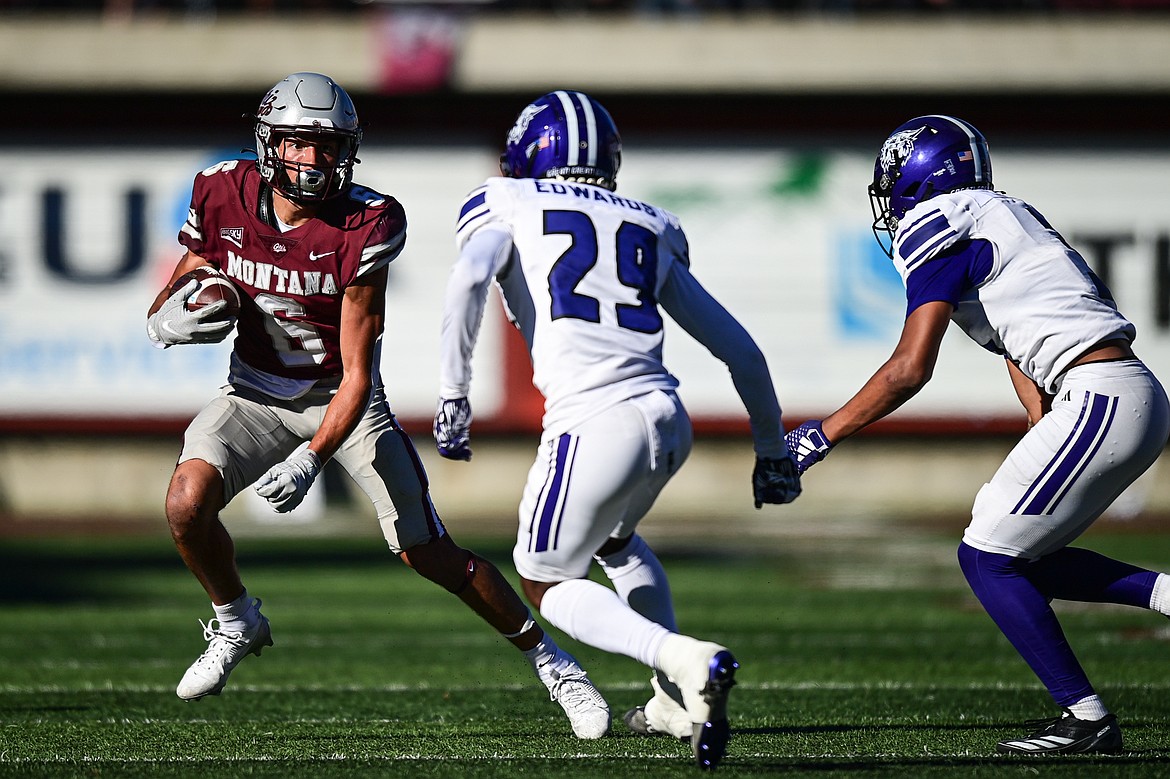 Grizzlies wide receiver Keelan White (6) picks up yardage after a reception in the fourth quarter against Weber State at Washington-Grizzly Stadium on Saturday, Oct. 5. (Casey Kreider/Daily Inter Lake)