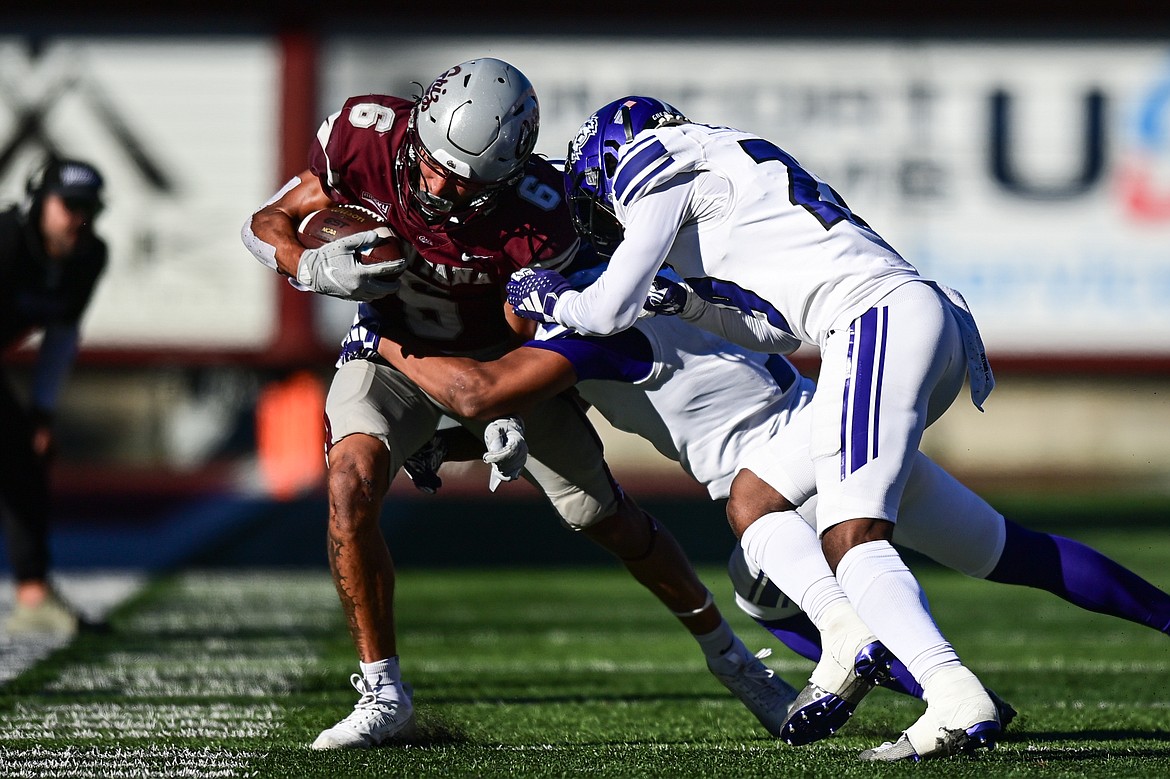 Grizzlies wide receiver Keelan White (6) picks up yardage after a reception in the fourth quarter against Weber State at Washington-Grizzly Stadium on Saturday, Oct. 5. (Casey Kreider/Daily Inter Lake)