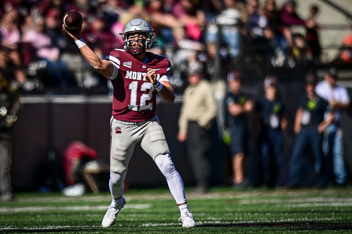 Grizzlies quarterback Logan FIfe (12) drops back to pass in the second quarter against Weber State at Washington-Grizzly Stadium on Saturday, Oct. 5. (Casey Kreider/Daily Inter Lake)