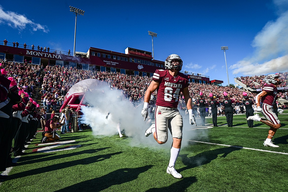 The Montana Grizzlies head out onto the field for their matchup against Weber State at Washington-Grizzly Stadium on Saturday, Oct. 5. (Casey Kreider/Daily Inter Lake)