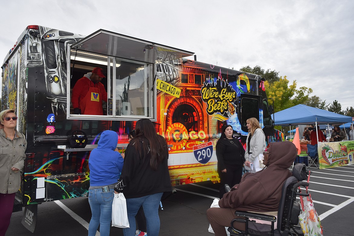 Wize Guys Beefs and Delicias were in the parking lot of the WorkSource job fair Friday. WorkSource staff were handing out free food and drink tokens to be claimed at the food truck.