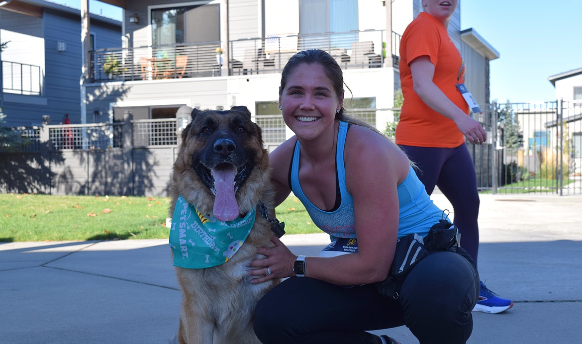 Allison Fruci and her dog, Theo, ran Saturday's 5K to celebrate Theo's 6th birthday.