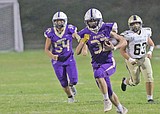 Perry's 3 TDs lead Pirates past Stevensville