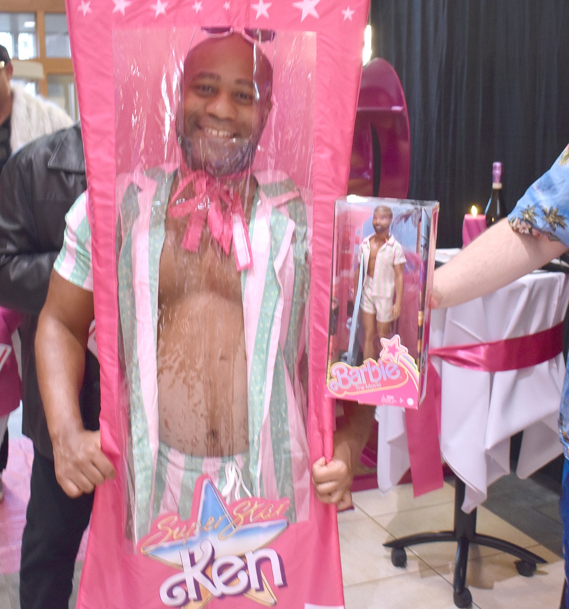 Timothy Johnson went a little further with his costume Saturday as a collectible Ken still in the original box.