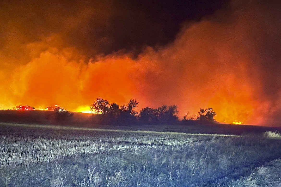 In this photo provided by the Arnegard Fire Protection District, a wildfire burn near Arnegard, N.D., Saturday, Oct. 5, 2024. (Arnegard Fire Protection District via AP)