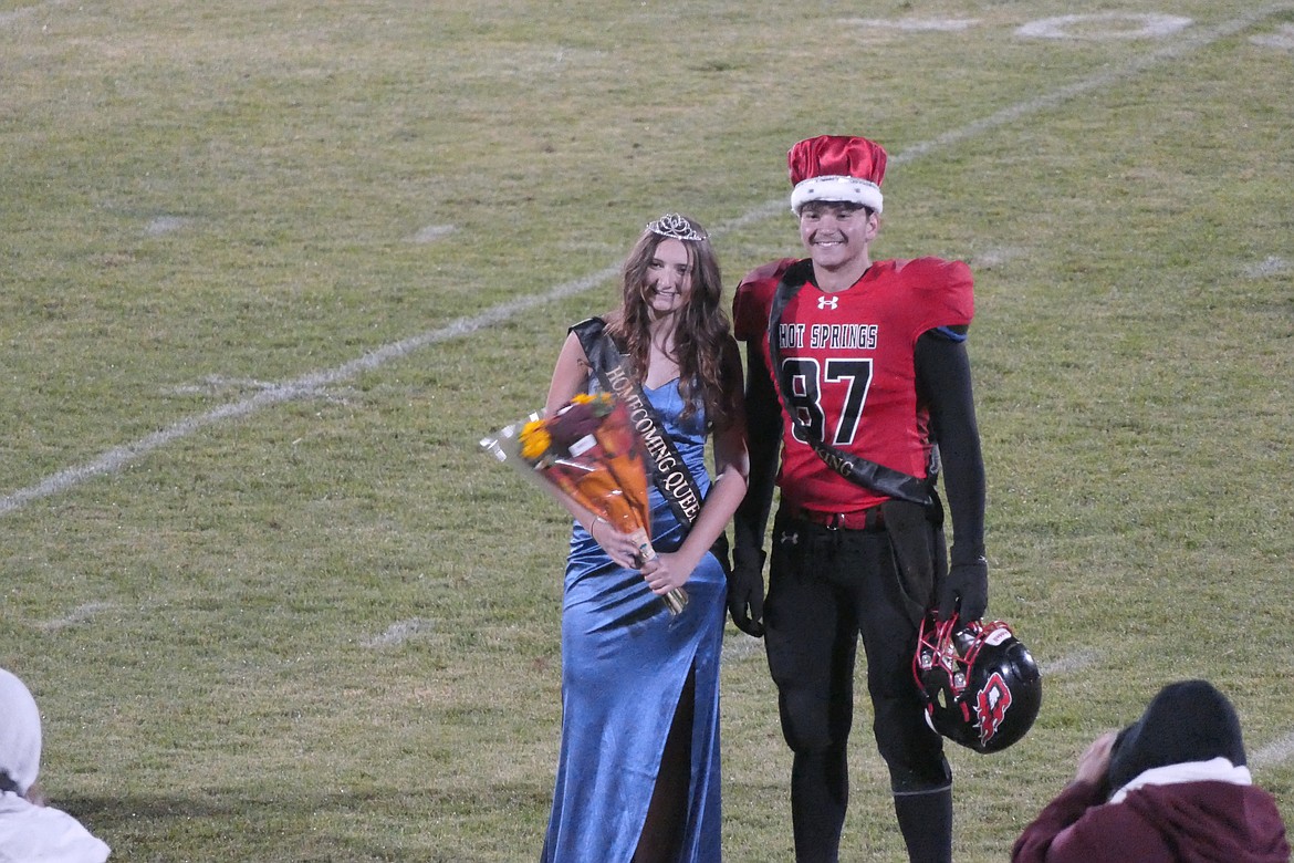 Homecoming Queen Lilian Sapanel, an exchange student from France, and King Pedro Vidotti (exchange student from Brazil) pose during halftime ceremonies Friday night in Hot Springs. (Chuck Bandel/VP-MI)