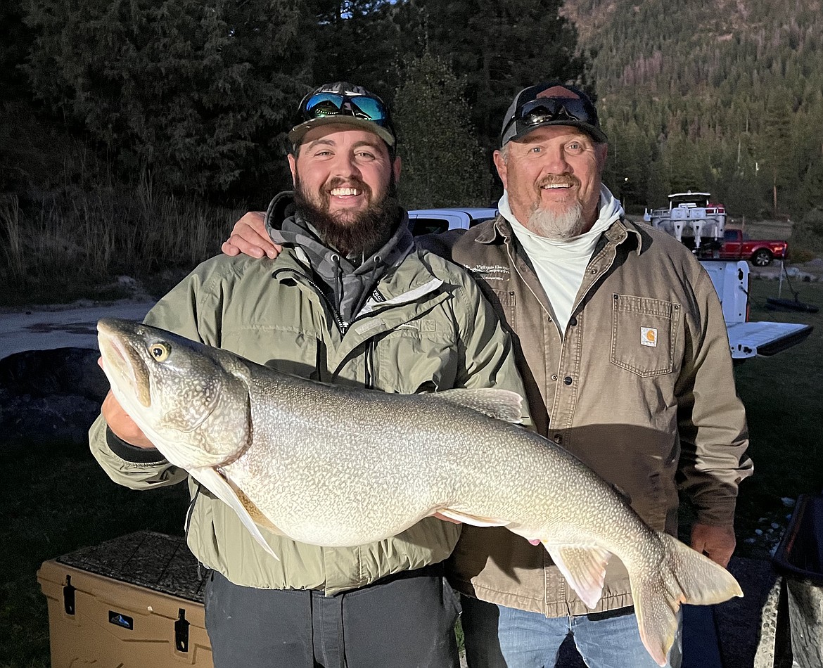 Ryker Bair of Helena and his father, Justin Bair of Dillon, landed this 36.25-inch 20.05-pound lake trout last weekend during Mack Days. It's the first entry in the large fish category. (CSKT Fisheries photo)