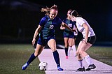 Pack boys soccer focused on now, girls hope to take AA by storm
