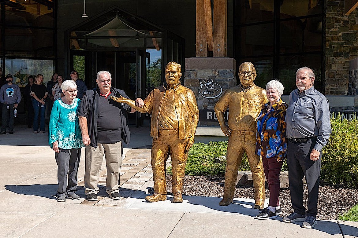 The Rocky Mountain Elk Foundation, as part of its 40th anniversary, unveiled the bronze statues of two of its founders, Charlie Decker and Bob Munson. From left, are Yvonne Decker, Charlie Decker, Vicki Munson and Bob Munson. (Photo courtesy Rocky Mountain Elk Foundation)