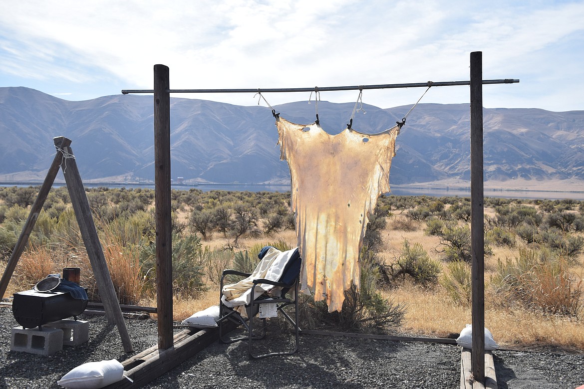 A hide is hung for a presentation of how Grant County's Indigenous populations worked to create leather.