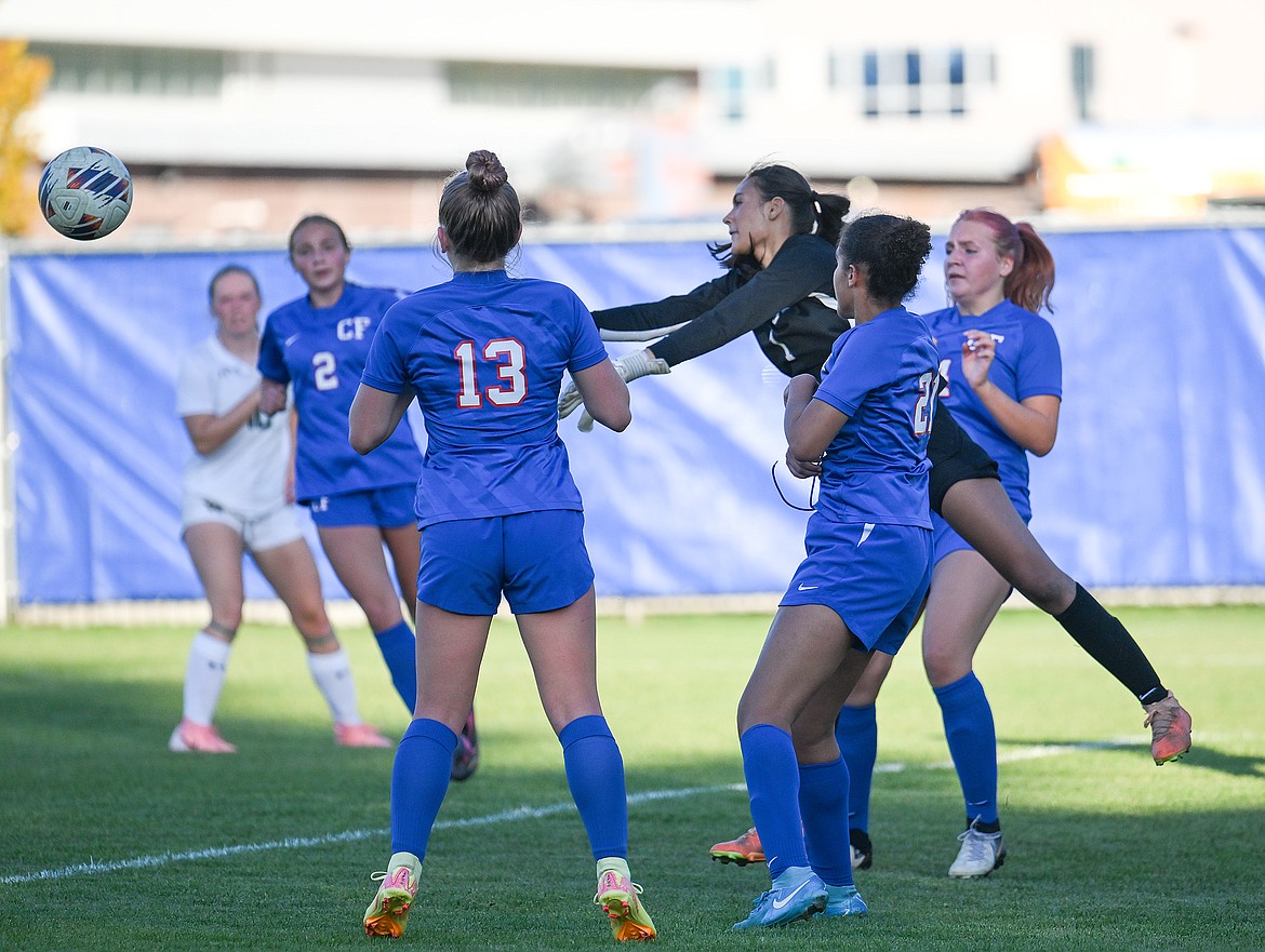 Columbia Falls keeper Erica Burguiere knocks away a Whitefish shot.