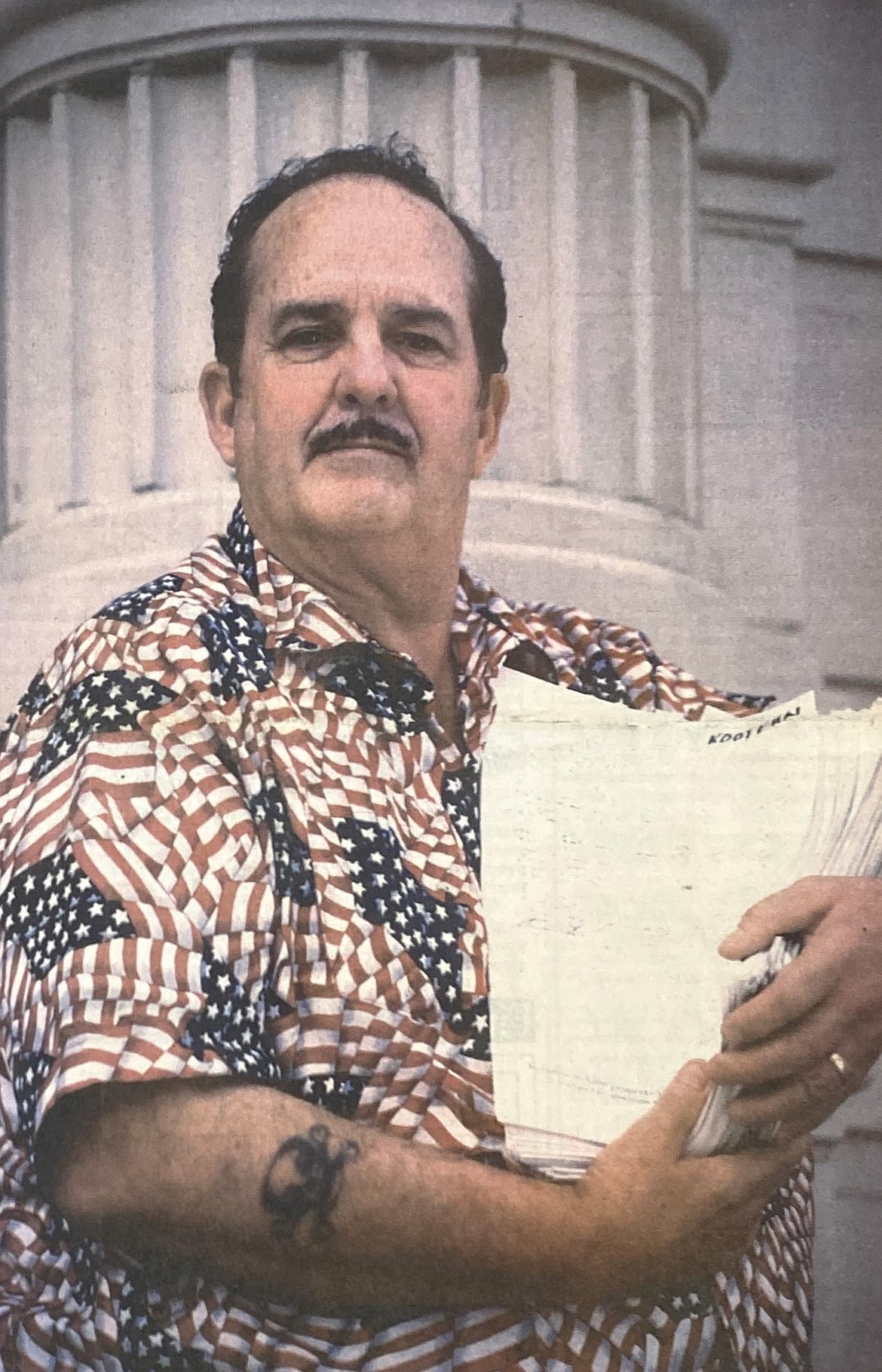 In 1994, tax activist Ron Rankin holds Proposition One petitions.