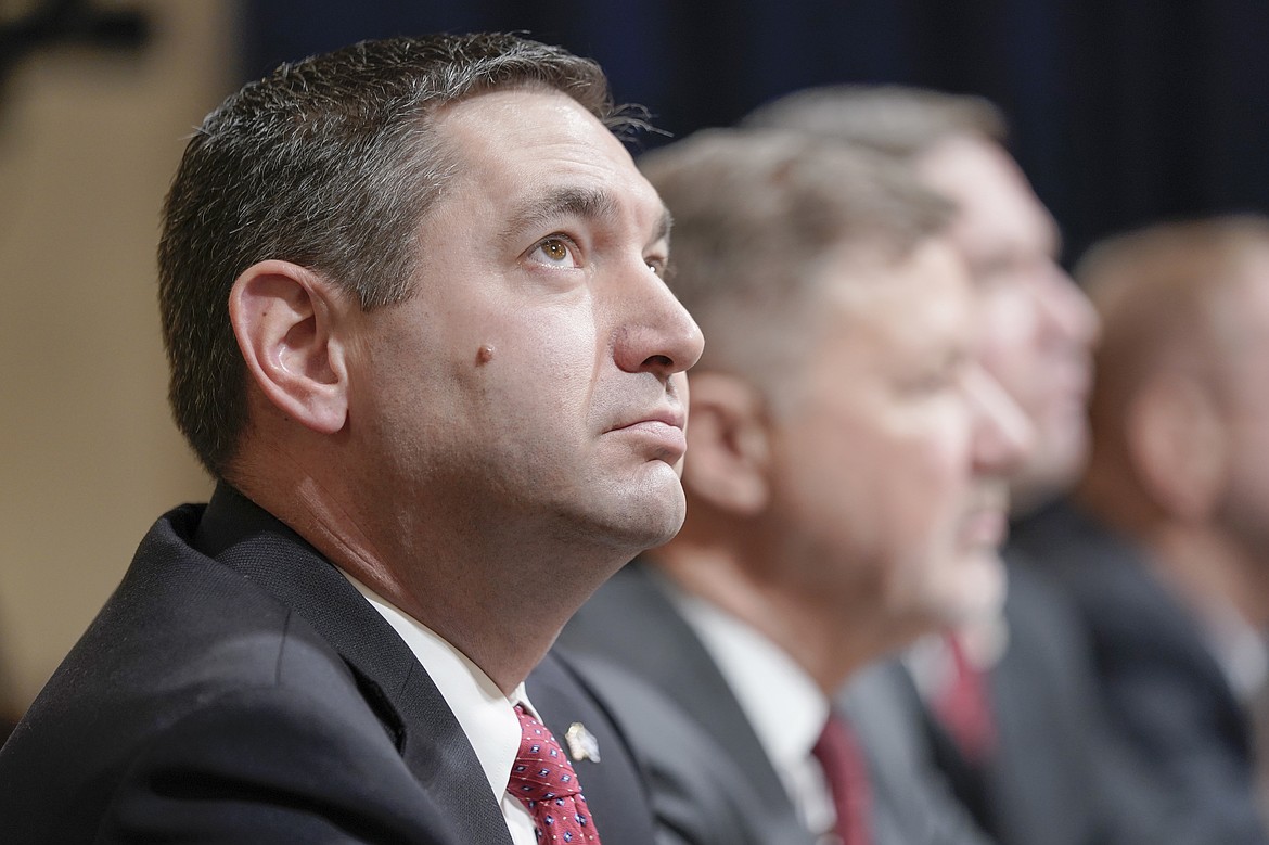 Montana Attorney General Austin Knudsen, left, testifies during a House Committee on Homeland Security hearing on Capitol Hill in Washington, Jan. 10, 2024. (AP Photo/Mariam Zuhaib, File)