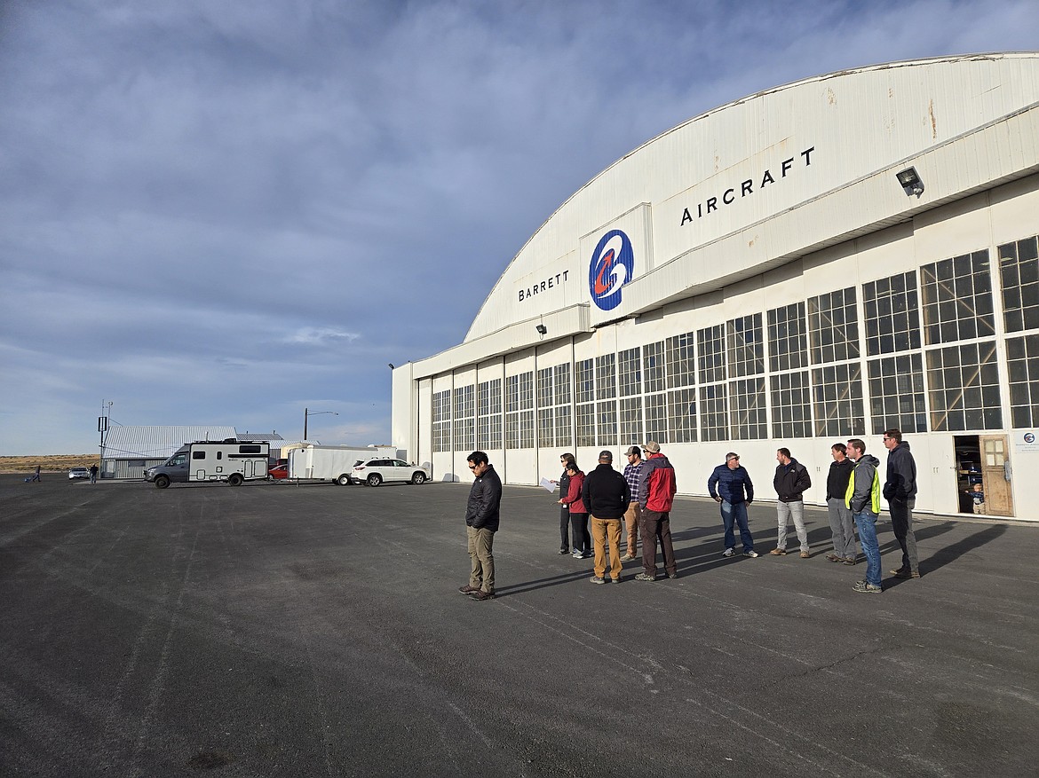 Pilots and FAA officials mingle at the fly-in at the Port of Ephrata.