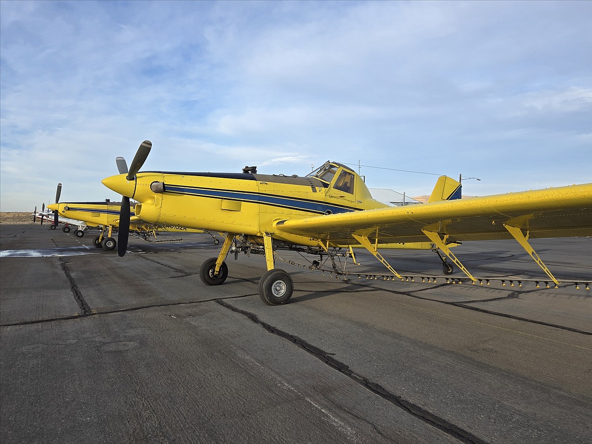 A close-up shot of the aircraft and aerial application hardware used to distribute herbicides and pesticides on crops. Making sure the equipment is set up correctly is a large part of managing bugs and weeds that can harm crops.