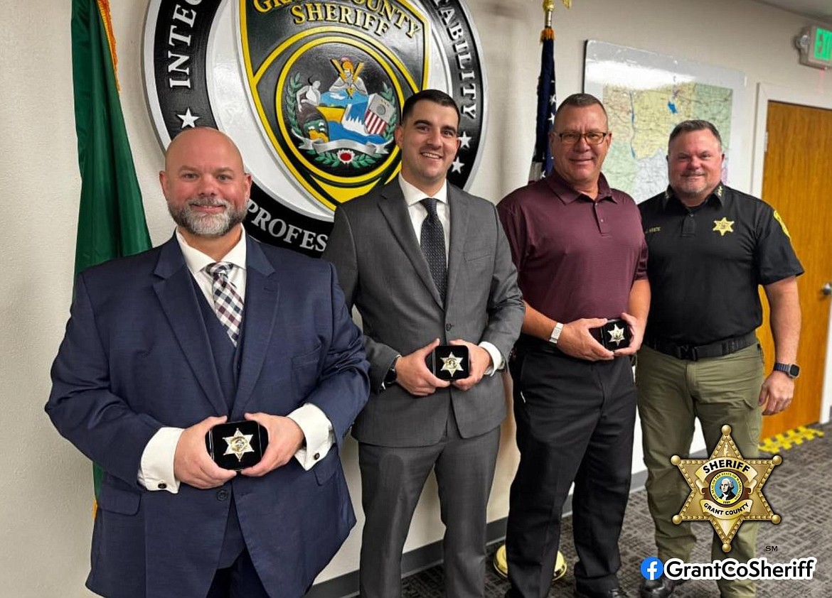 Grant County Sheriff’s Office Sheriff Joey Kriete, far right, administered the oath of office to three new deputies on Monday. From left to right are Deputy Justin Rowland, Deputy Ryan Borden and Corrections Deputy Matthew Soukup.