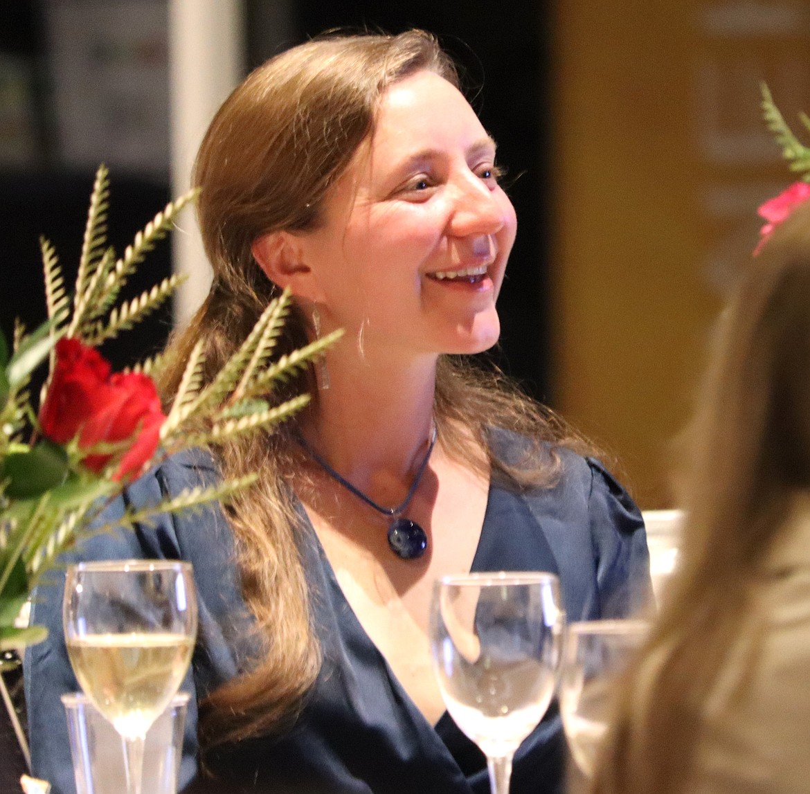 Jennifer Passaro smiles as she watches the 28th annual Mayor's Awards in the Arts program on Wednesday, Passaro was introduced as Coeur d'Alene's Poet Laureate.