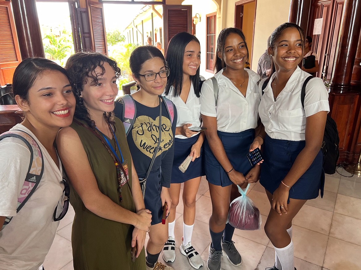 At the music conservatory in Cuba where the choirs donated 18 musical instruments. India Kucherry, in the green dress, was a soloist on this tour.