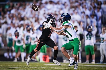 Glacier wide receiver Ethan Anderson (37) catches a pass downfield in the first quarter against Flathead at Legends Stadium on Thursday, Oct. 10. (Casey Kreider/Daily Inter Lake)