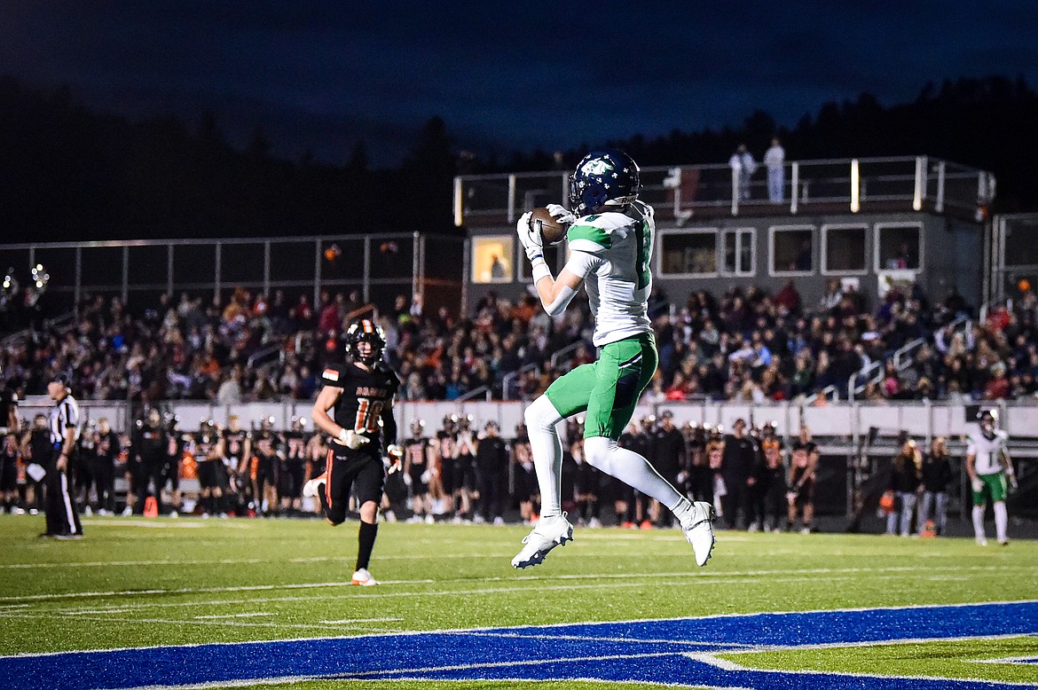 Glacier wide receiver Cooper Pelc (8) catches a touchdown reception in the second quarter against Flathead at Legends Stadium on Thursday, Oct. 10. (Casey Kreider/Daily Inter Lake)