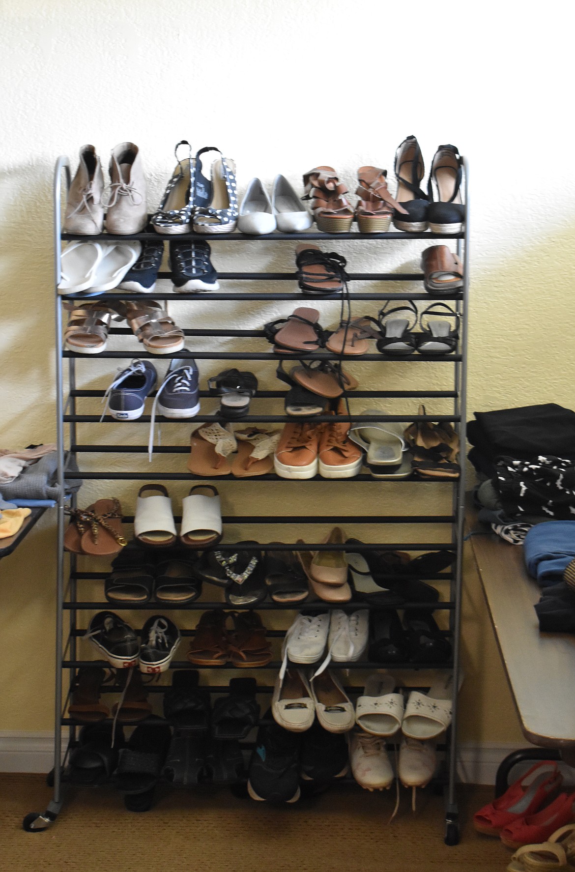 Shoes are laid out on a rack at the Moses Lake Church of Christ clothing bank.