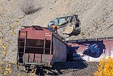 Train derails on border of Glacier National Park, spilling thousands of bushels of grain