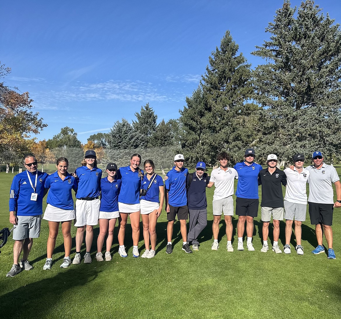 Courtesy photo
The Coeur d'Alene boys and girls golf team concluded the season at the state 6A golf tournament on Saturday at Highland Golf Course in Pocatello. From left are girls coach Jeff Lake, Leah Heavener, Jossetta Williams, Mady Riley, Ella Wilson, Sophia Vignale, Hunter Paquin, Jake-Ryan Borowski, Grant Potter, Dylan Cook, Brady Rubert, Ben Focke and boys coach Chase Bennett.