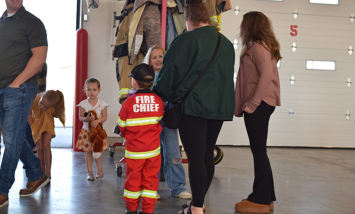 A young boy donned a Fire Chief costume at the opening of Fire Station 3 in Post Falls on Saturday.