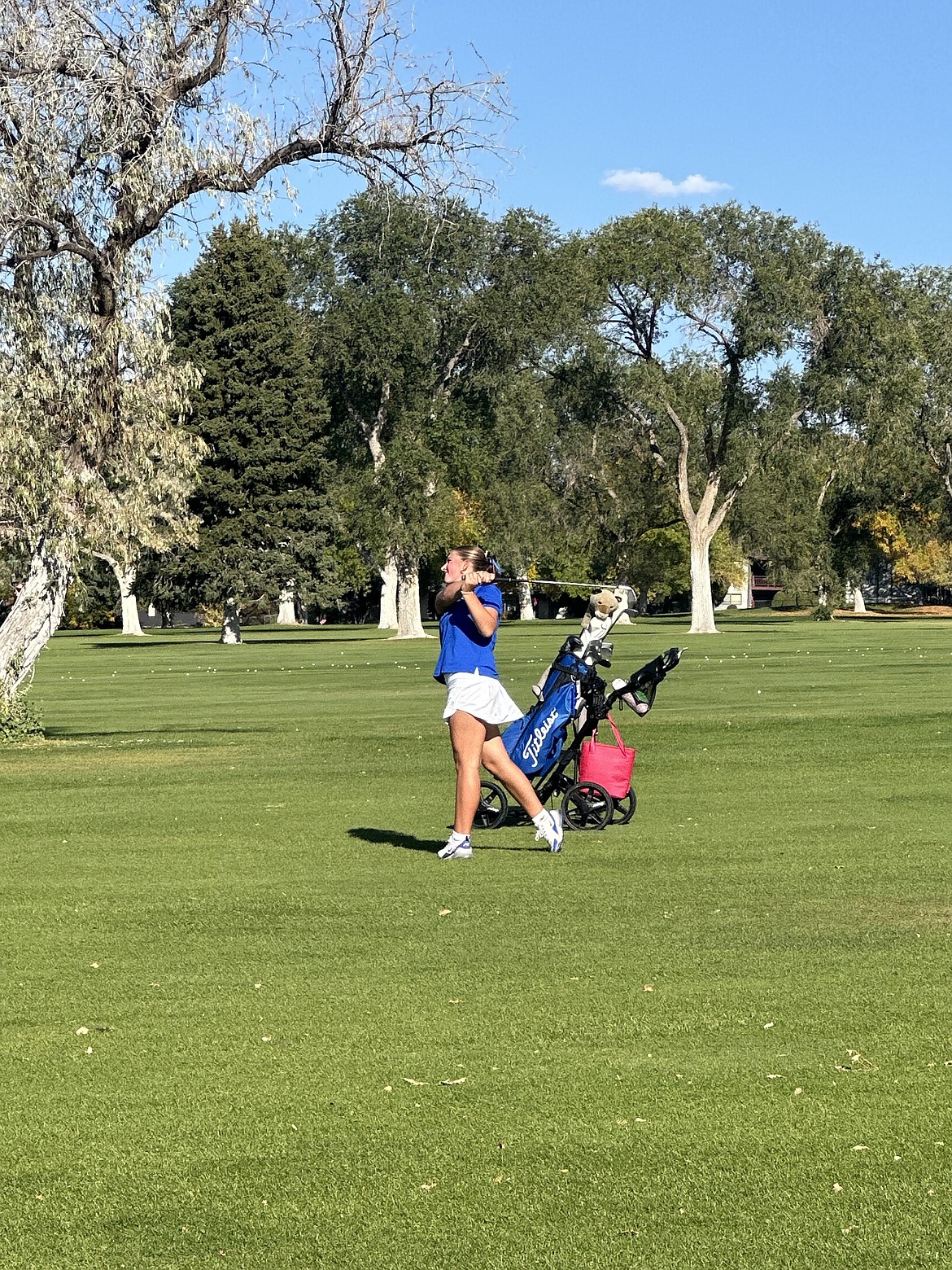 Courtesy photo
Coeur d'Alene freshman Ella Wilson watches a shot during the state 6A golf tournament on Saturday in Pocatello.