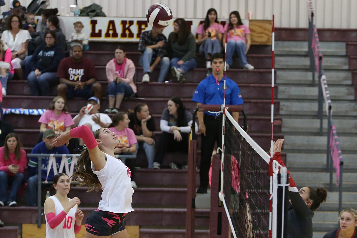 Moses Lake junior Kardyn Martinez (14) starts to spike the ball Thursday against Sunnyside. Martinez had seven kills and eight blocks.