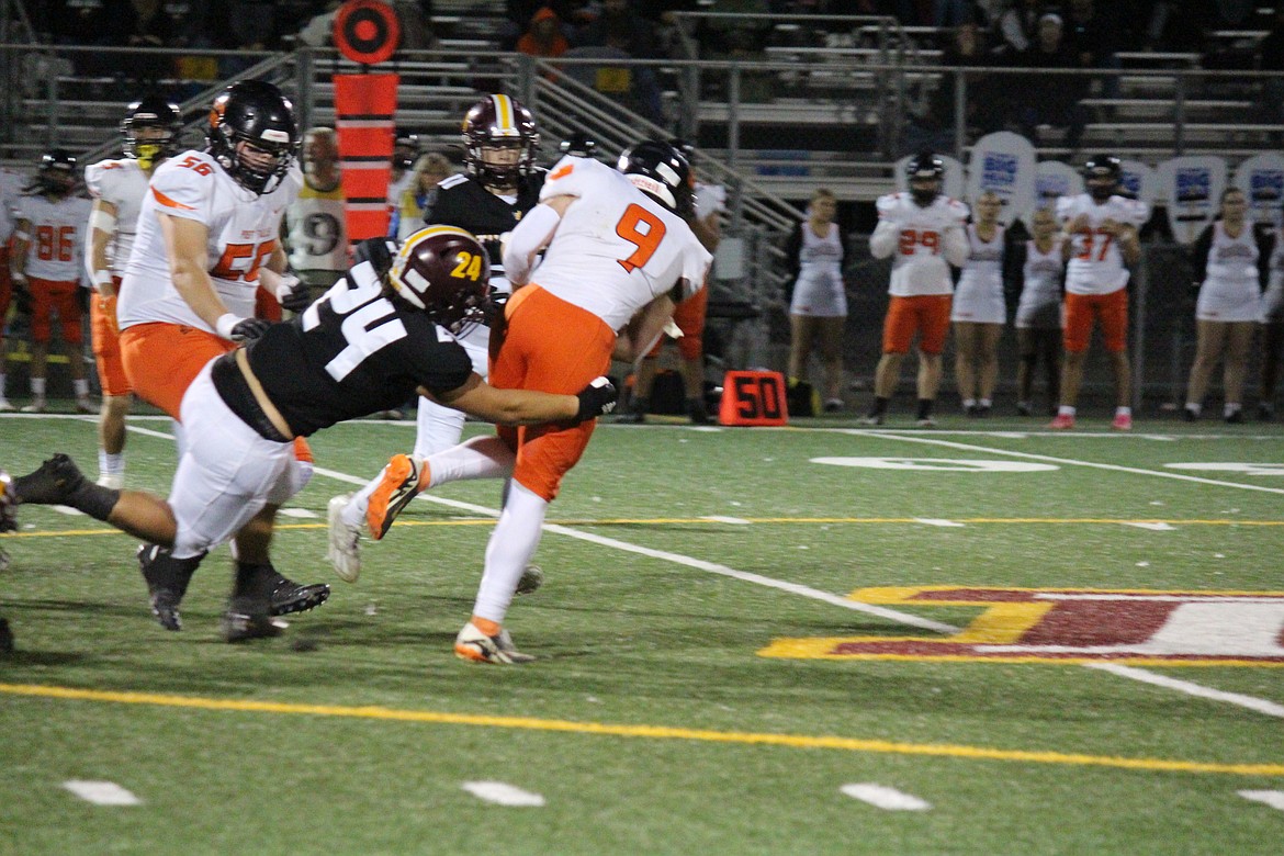 The Post Falls offense came back for a quick touchdown after Moses Lake built its lead, but while the Moses Lake defense gave up some offensive yards, they held Post Falls to two additional touchdowns and blocked an extra point. Petrah Mackenzie (24) stops a Post Falls runner.