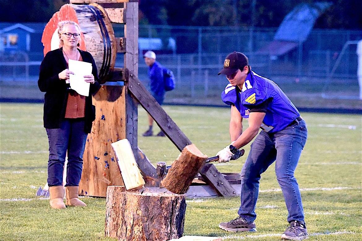 Sophomore Quinton Caulboy participated in the wood splitting event Thursday, Oct. 10, 2024, during Libby Homecoming festivities. (Scott Shindledecker)