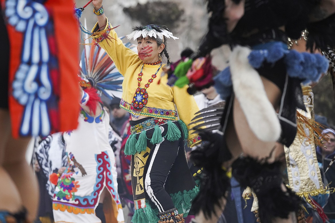 A dancer performs on Indigenous Peoples Day Monday, Oct. 14, 2024, in San Francisco. (AP Photo/Minh Connors)