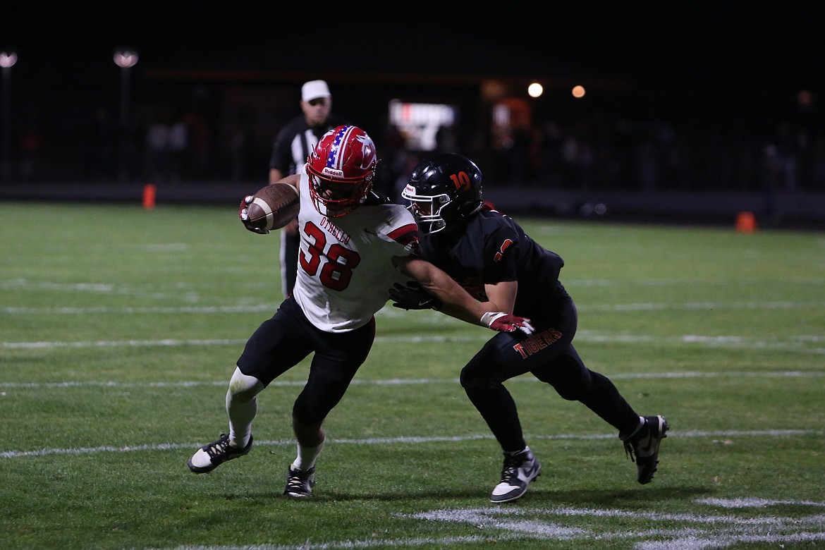 Othello junior Gavin Carl (38) led the Huskies in rushing with 176 yards on Saturday. Carl also scored the team’s first touchdown of the day.